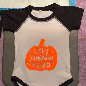 Cricut homemade baby onesie.